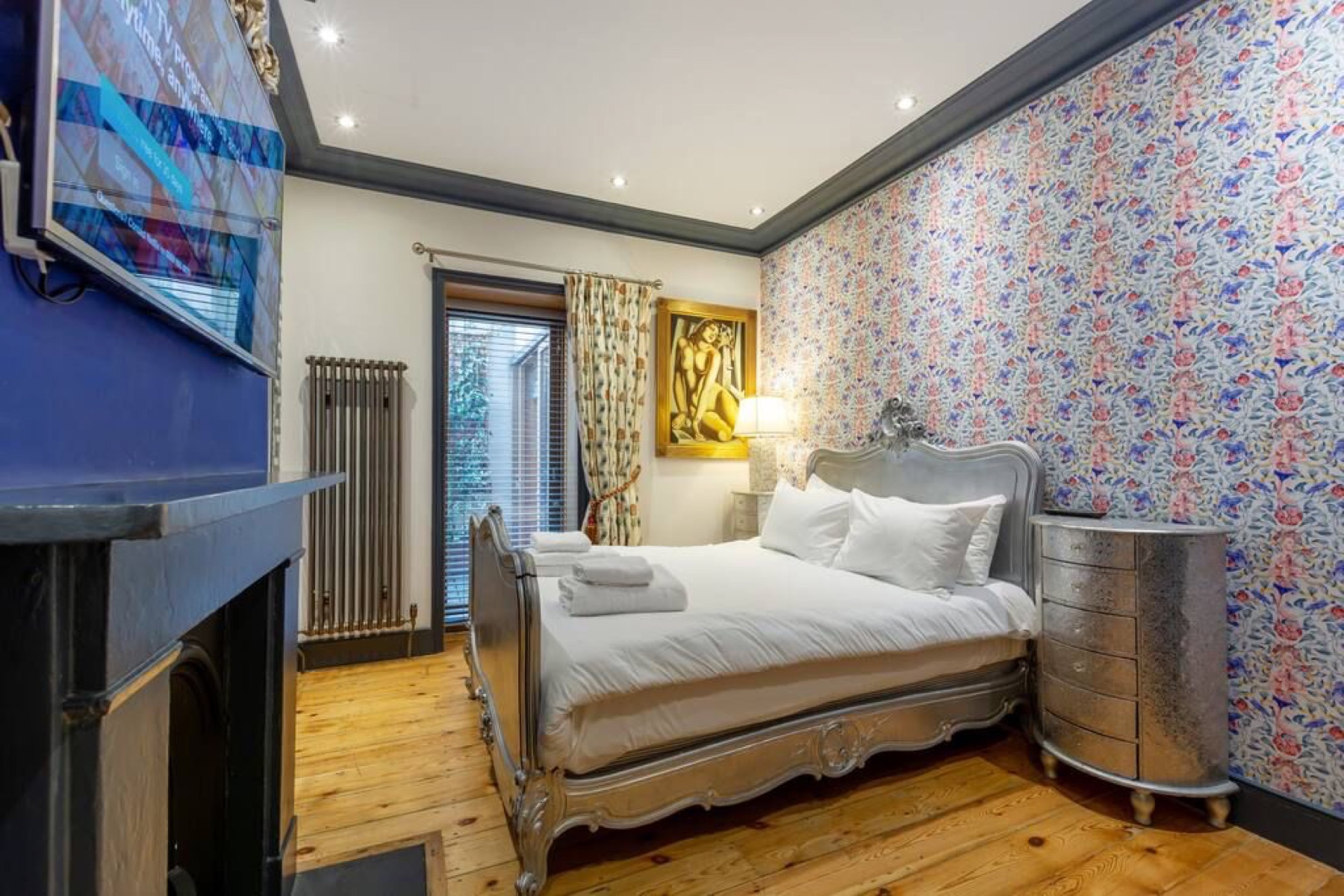 Individually designed bedroom at the Soho property